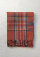 Recycled wool blanket in Stewart Royal Antique Tartan with classic plaid pattern, soft texture, and warm, cozy appearance.