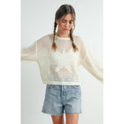 ISLEFIELD star open waffle pullover sweater with a cozy, textured knit design in a stylish open weave pattern.