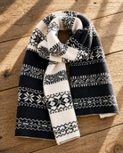 ISLEFIELD Flora scarf with floral pattern, lightweight fabric, featuring vibrant colors and intricate design, displayed flat.